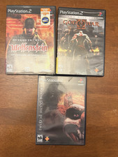 3 Ps2 Games- God of War 2,Twisted Metal Black and Wolfenstein.  
