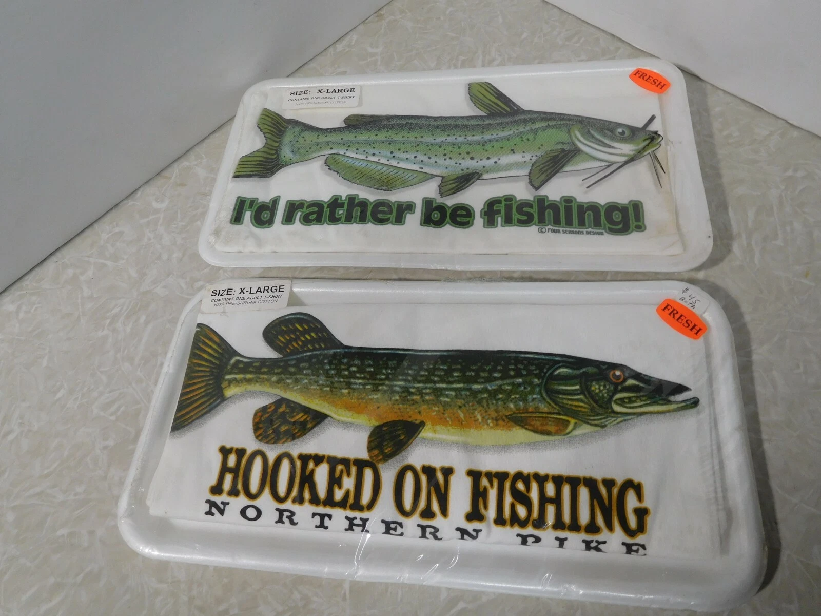 2 XL Fish t-Shirts Catfish & Pike packaged like fillets