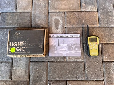 Unique Lighting Systems Light Logic Wireless Lighting Control Hand Held Remote