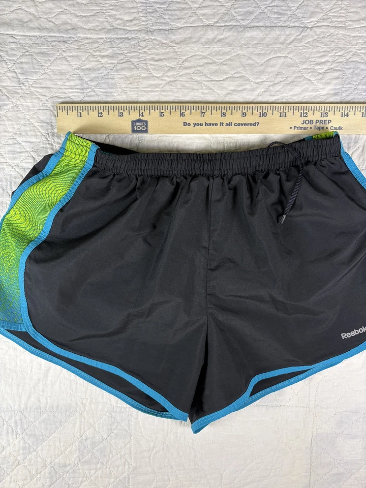 Pantalones Cortos de Correr Reebok PlayDry para Mujer Medianos Ligeros Atléticos Gimnasio Entrenamiento Foto 2 de 4