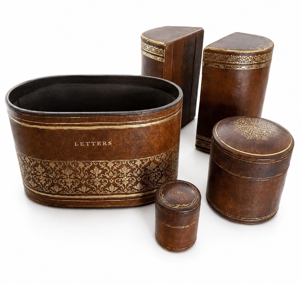 Full Italian-style leather desk set with letter holder and bookends — the kind of set that makes a home office look like a Florentine study.