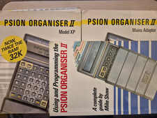 Psion Organiser 2, Model XP, 2 x 32kb Datapacks, Mains Adapter and Book