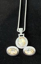 Silver Tone Necklace with Yellow Rhinestone and Pierced Earrings Set.