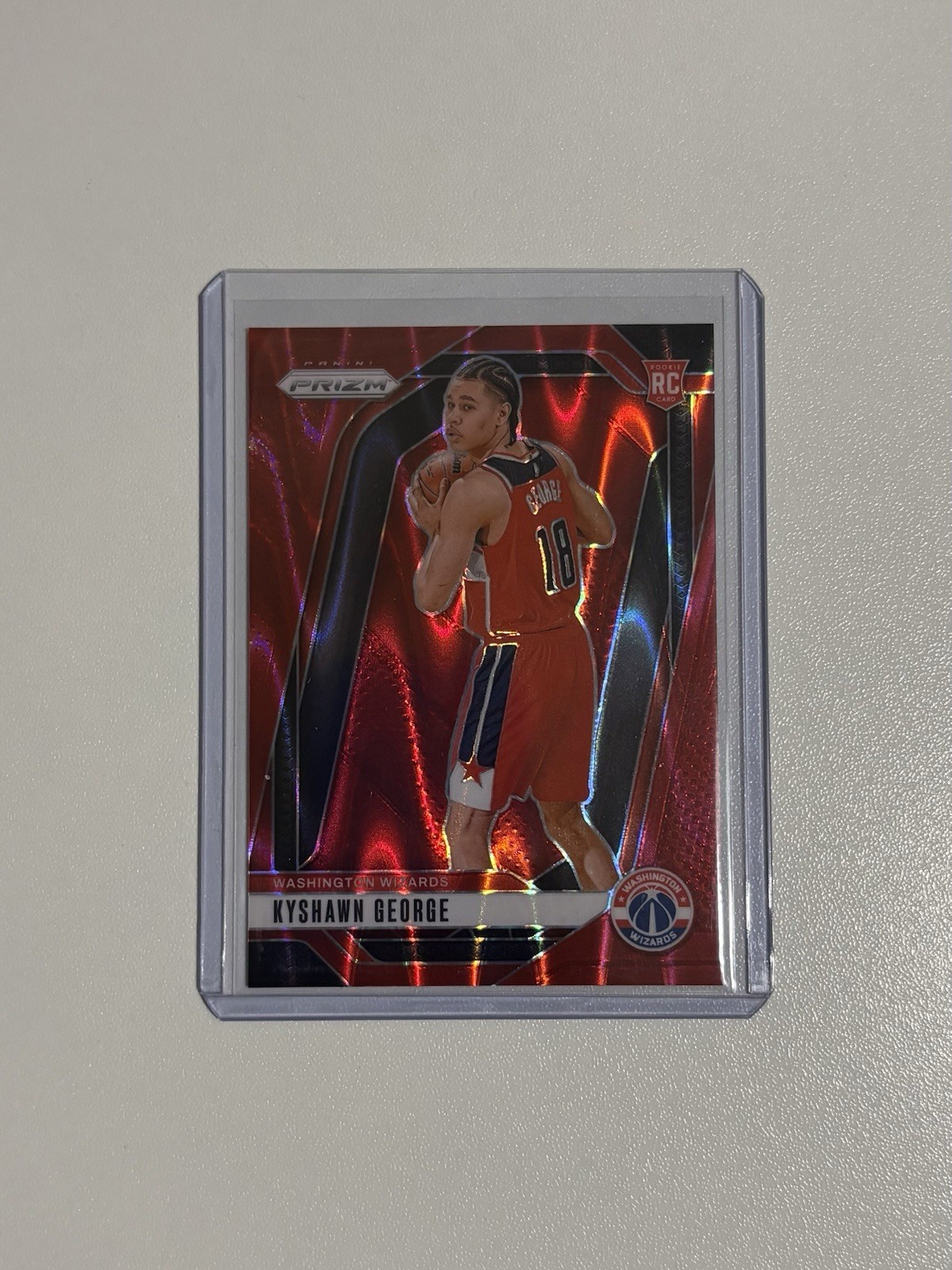 2024-25 Panini Prizm Kyshawn George #257 Red Seismic Prizm /299 (RC)