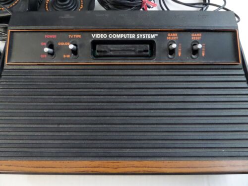Atari 2600 (4 Switch) With 2 Joysticks, Paddles, 27 Games, Instructions, Tested - Picture 3 of 9