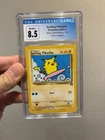 Pokemon Surfing Pikachu Black Star League Promo 28 CGC 8.5
