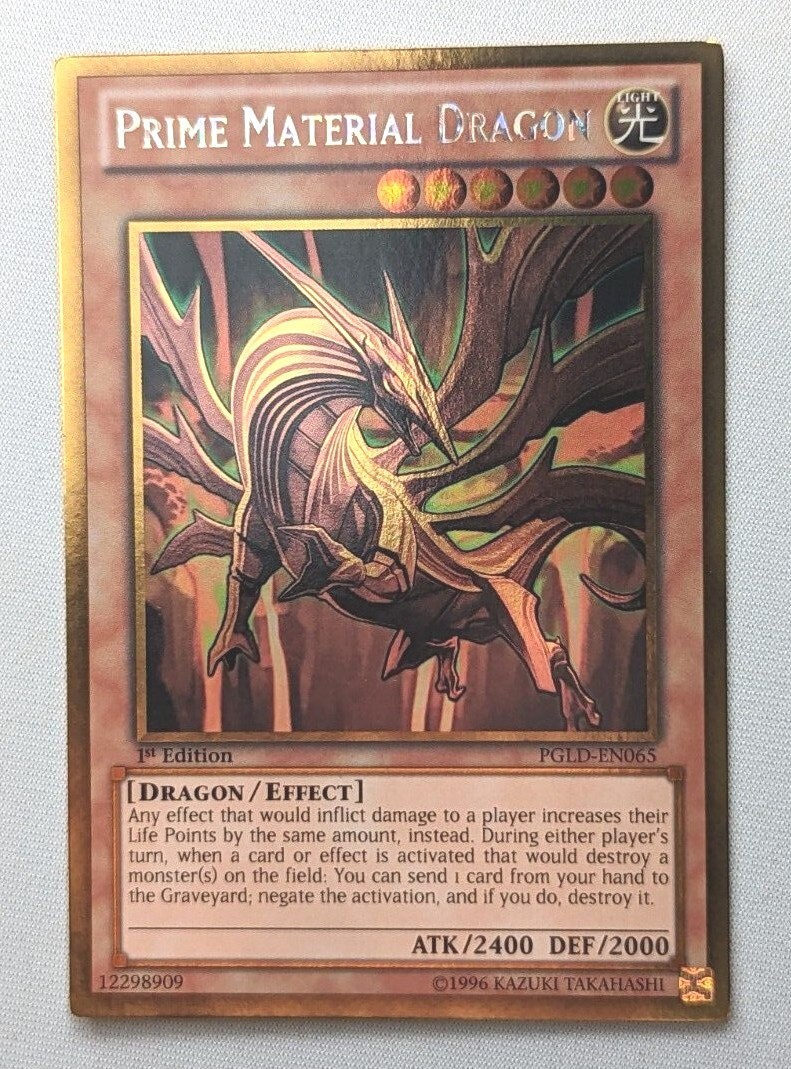 Carta Yu-Gi-Oh! Prime Material Dragon - Monstruo Efecto, Número PGLD-EN065, Rareza Gold Rare Ilimitada