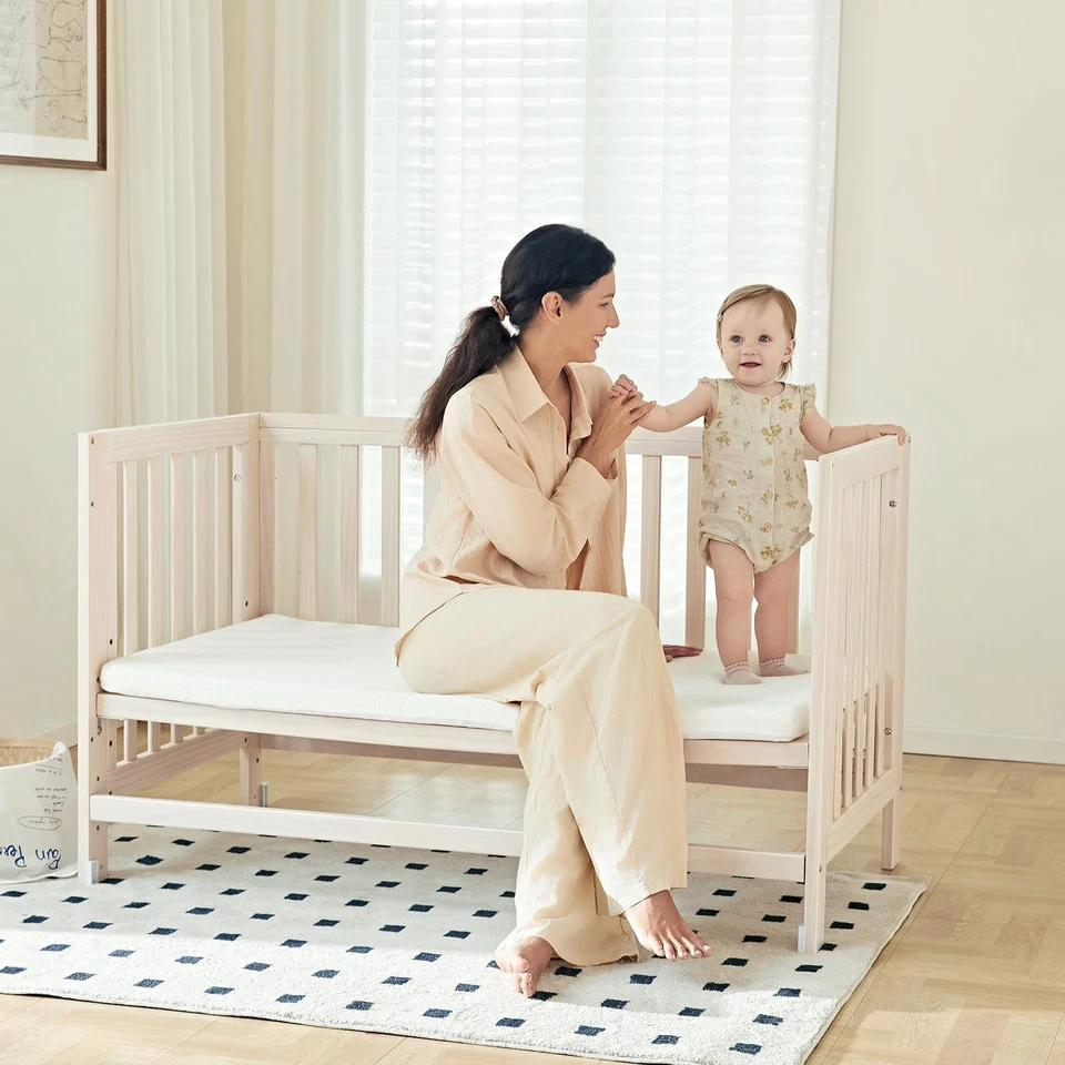 EvoNest Baby Crib, 6 in 1 Convertible Mini Crib with Wheels, 100% New Zealand... - Image 4 of 4