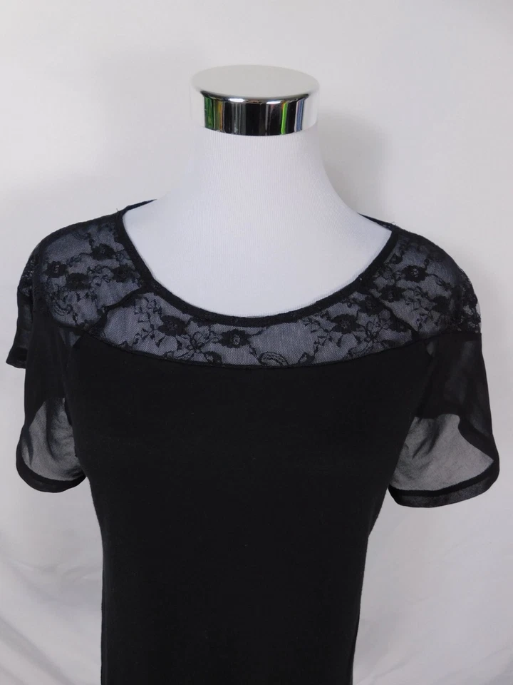 Top de encaje negro con yugo manga transparente de Ecoté talla S Foto 2 de 4