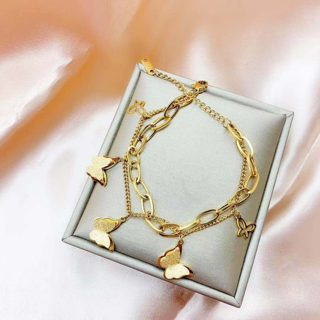 Butterfly charm 2024 bracelet gold