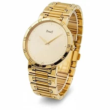 Men's Piaget 31mm Dancer Vintage 18K Yellow Gold Band Watch with Champagne Dial.