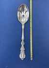 International Sterling Silver Angelique pierced Serving Spoon 8 3/8 in