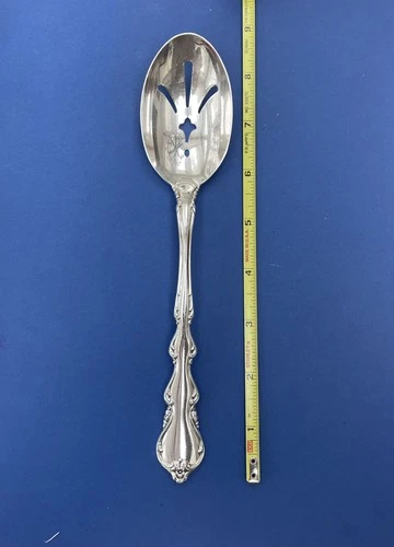 International Sterling Silver Angelique pierced Serving Spoon 8 3/8 in