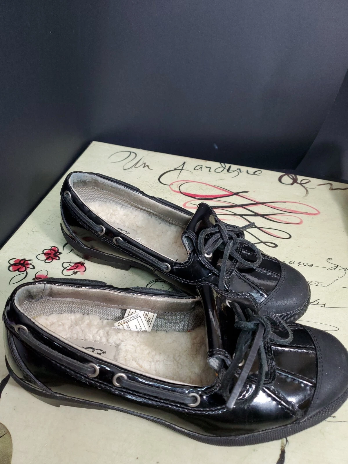 Scarpe mocassino UGG Australia nere slip on fodera in pelle di pecora 7