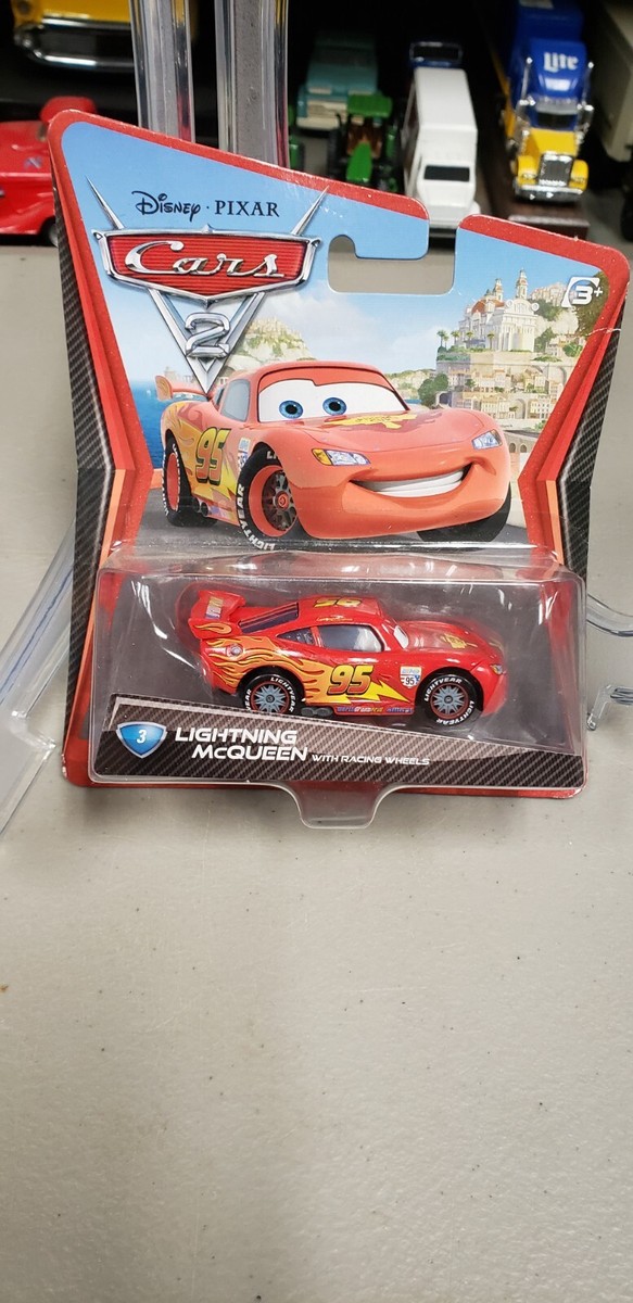 DISNEY PIXAR CARS LIGHTNING MC QUEEN W/ RACING WHEELS!!! NOS V2797