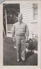 WW2 Photo of Soldier Posing By Porch Steps And Clapboard House