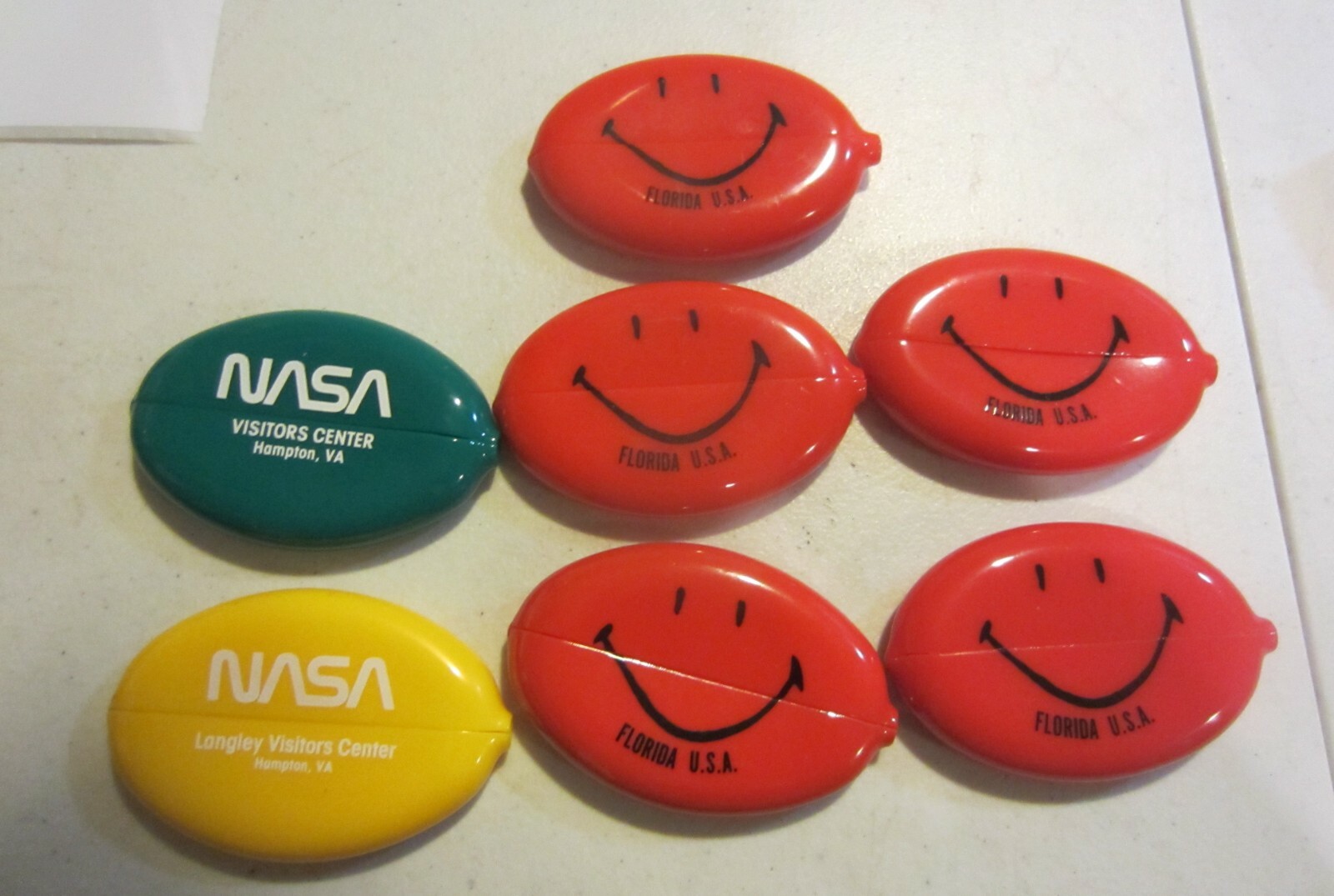 Vintage squeeze coin holders Florida/smiley face … Gem