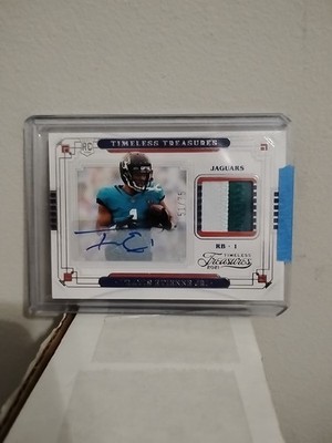 2021 chronicles timeless treasures Travis Etienne jr auto /75