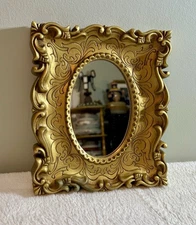 VTG Homco, Home Interior, Hollywood Regency Gold Tone Wall Mirror, 9 in X 7.5”.