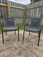 2 X Black rattan garden chairs