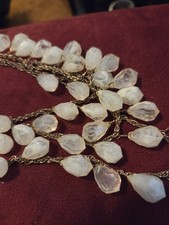 vintage statement necklace features chunky, white marbled lucite beads