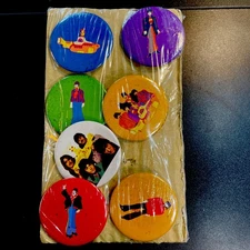 Complete unopened set of 1968 Beatles buttons. 7 buttons. 