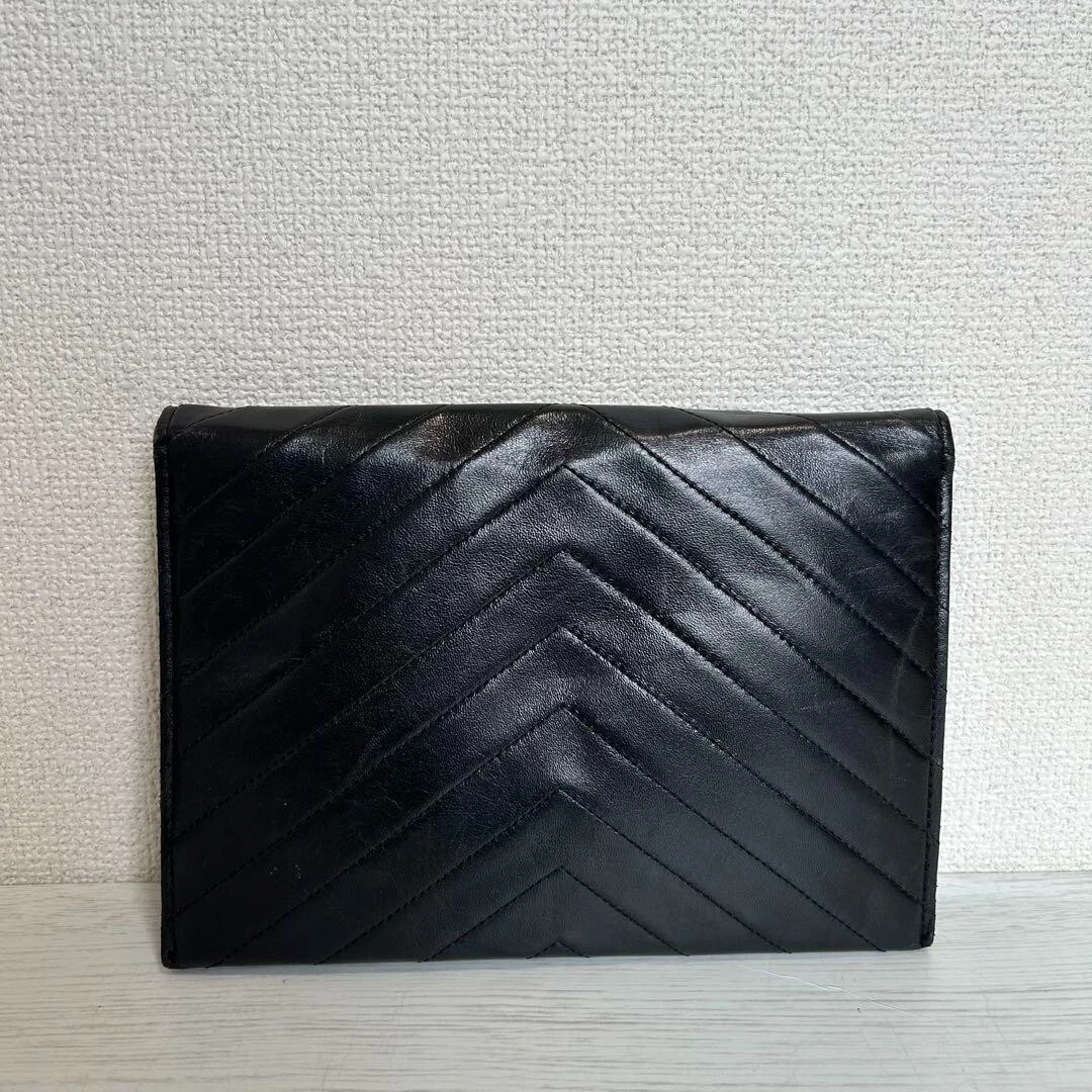 SAINT LAURENT (YSL) Pochette YSL Saint Laurent in pelle trapuntata nera busta pochette 24 5 cm usata