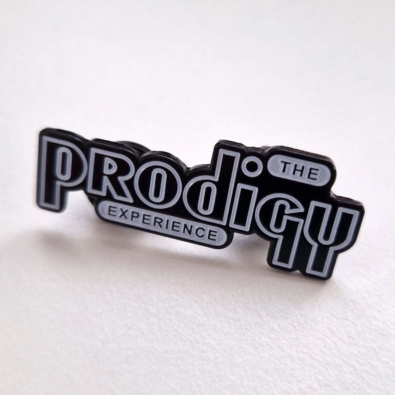 Buy The Prodigy Experience pin brooch