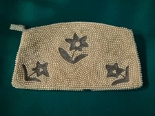 Vintage Beaded Clutch with flower design and zipper closure. Made in Japan.