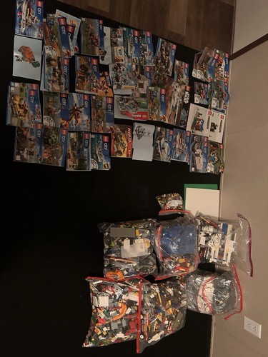 LEGO Bulk and Instruction Manuals. Various sets mixed in.
