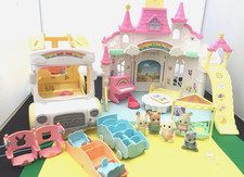 SYLVANIAN FAMILIES SUNNY CASTLE AND RAINBOW FUN NURSERY BUS BUNDLE WITH BABIES