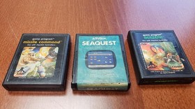 Atari 2600 Game Lot 24 Carts Pitfall Kaboom Atlantis Mario Bros Pac‑Man