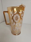 Vintage Jeannette Iridescent Marigold Carnival Glass Pitcher White Floral 10”