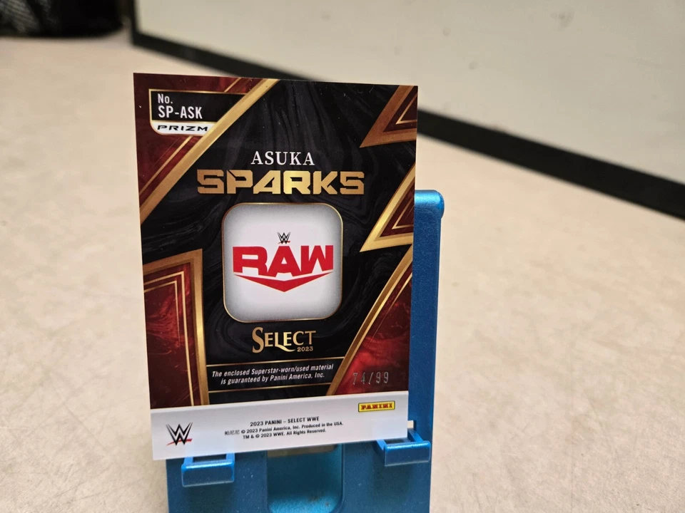 2023 Select WWE Asuka Sparks Silver Prizm Worn/Used Relic Patch  RED /99 - Image 2 of 2