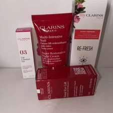 Clarins Paris Bundle Of 4!! Lip Oil, Night Cream, Eye Lift, Re-Fresh