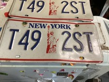 Vintage Pair of New York "Statue of Liberty" License Plates T49 2ST good shape