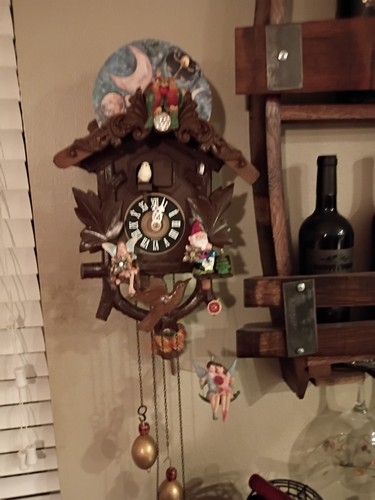 VINTAGE FAIRY, GNOME AND MOON DIAL CUCKOO CLOCK MOVEING STARS.BIRD,SWING. WORKS