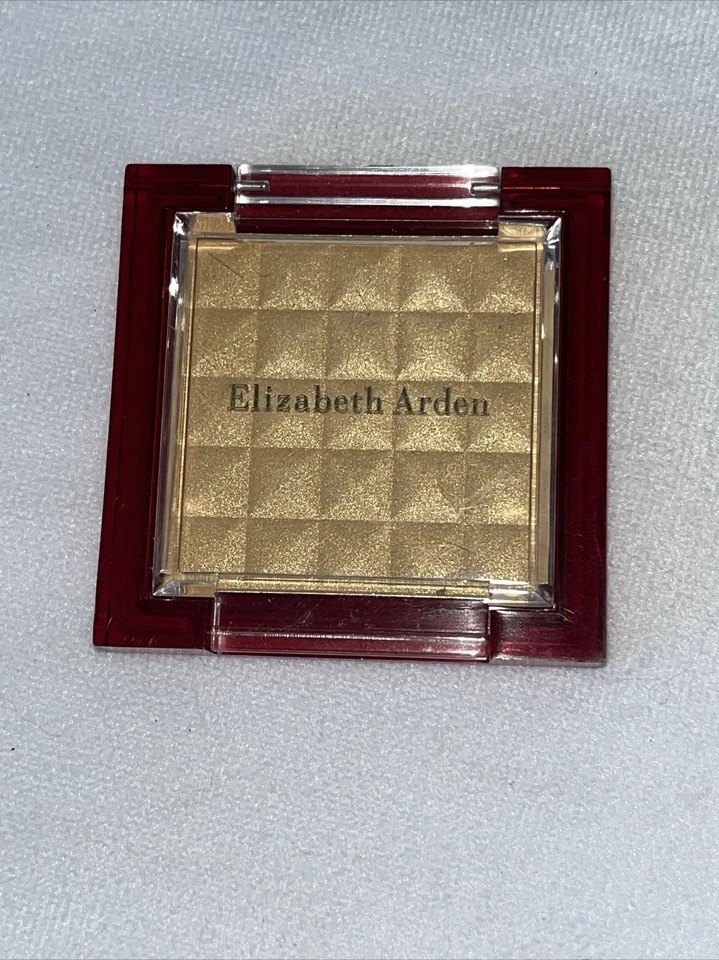 Polvo brillante dorado Elizabeth Arden, dorado, 0,15 oz, 4,3 g Foto 2 de 3