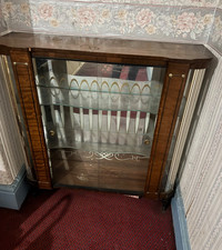 Vintage glass display cabinet with mirror  back