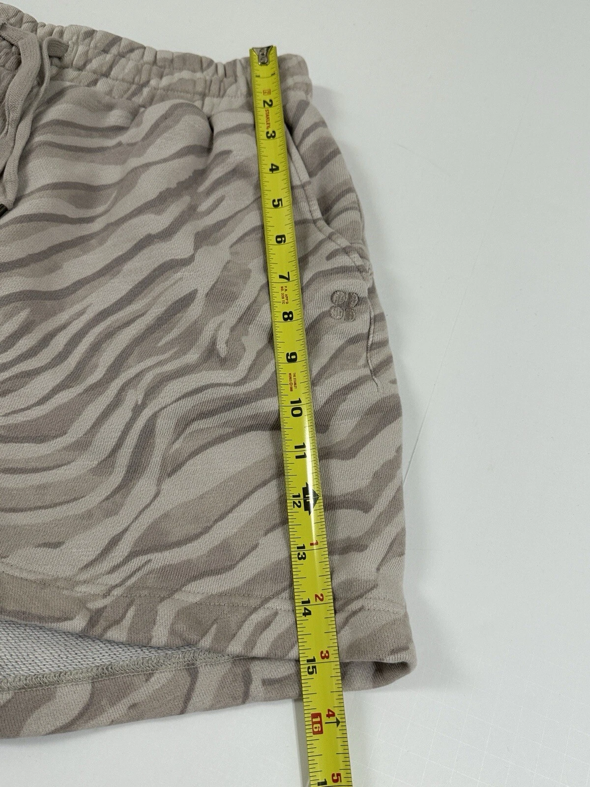 sweaty-betty tan zebra print cotton terry pull on shorts