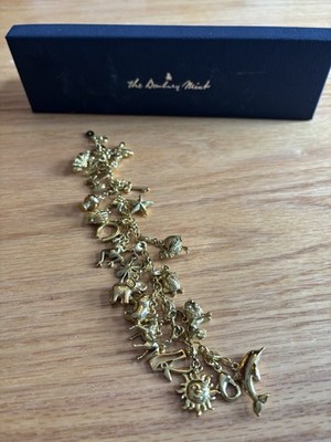 The Danbury Mint 21 Gold Tone Charm Bracelet Animals/ Celestial/nature/symbols