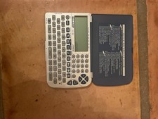 Sharp YO-P300 Pocket Calculator Calendar Cloc...