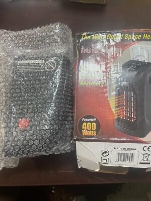 Wall Outlet space heater plug in warm air blower 400 Watts