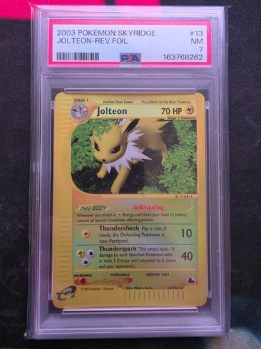 PSA 7 NEW CERT POP 17 2003 Pokemon Skyridge #13/144 Jolteon Reverse Foil