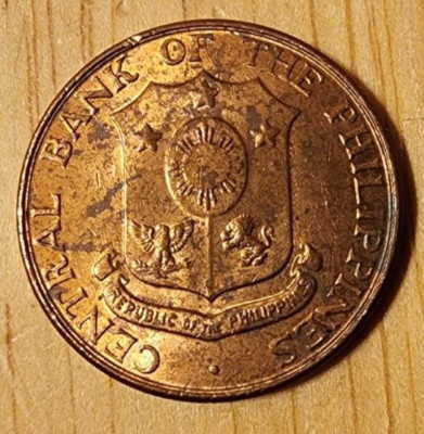 Philippines One Centavo 1963 Central Bank brass coin earthquake wrapper foreign