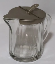 McKee Glass Clear Heavy Syrup Pitcher With Metal Flip Top And Handle- 1951
