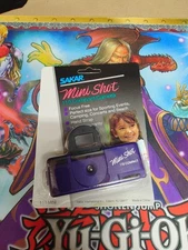 VINTAGE Sakar 110 Film Micro Mini Shot Travel Handheld Camera Purple- NEW 