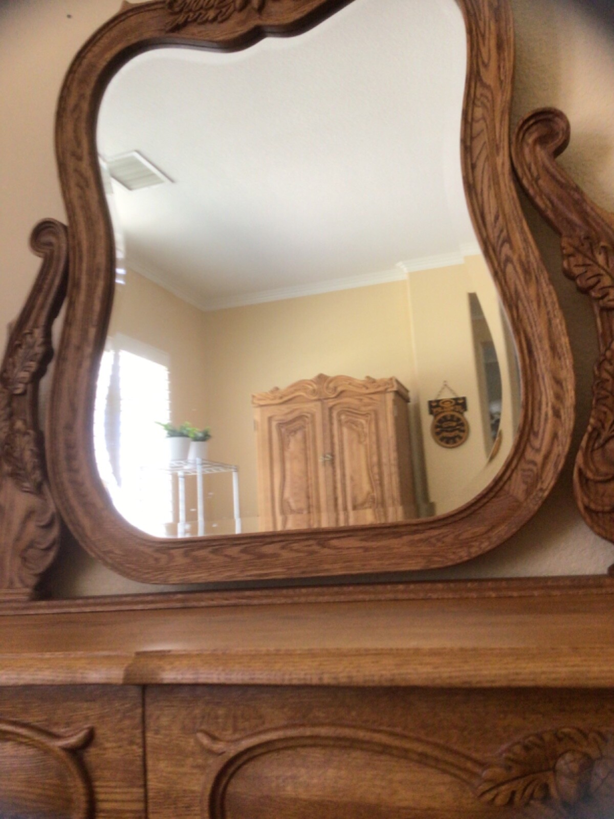 OAKWOOD INTERIORS 10 DRAWER DRESSER WITH BEVELED GLASS MIRROR