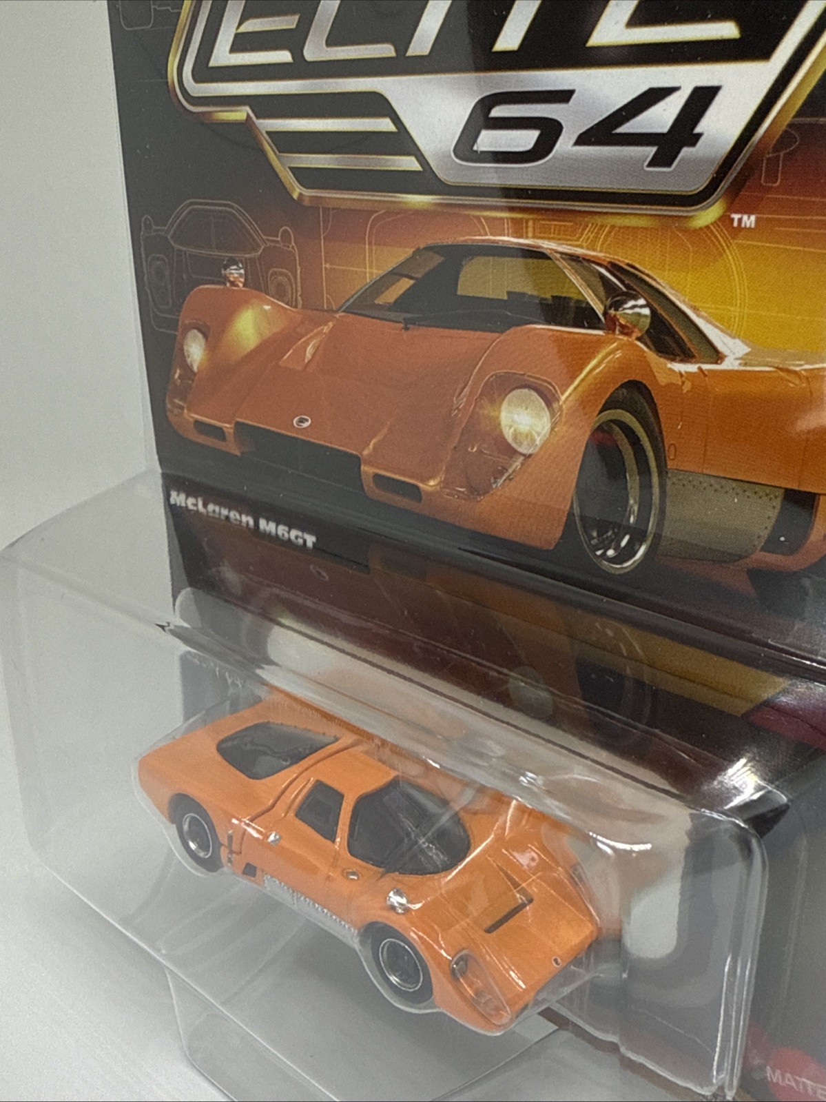 Hot Wheels Elite 64 #12 McLaren M6GT Orange 1:64 Diecast Real Riders HWG05
