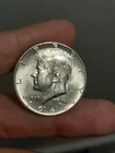 1964- D Kennedy Half Dollar BU.  #D